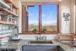 The kitchen has all the necessary appliances you will need and the view is a big plus.